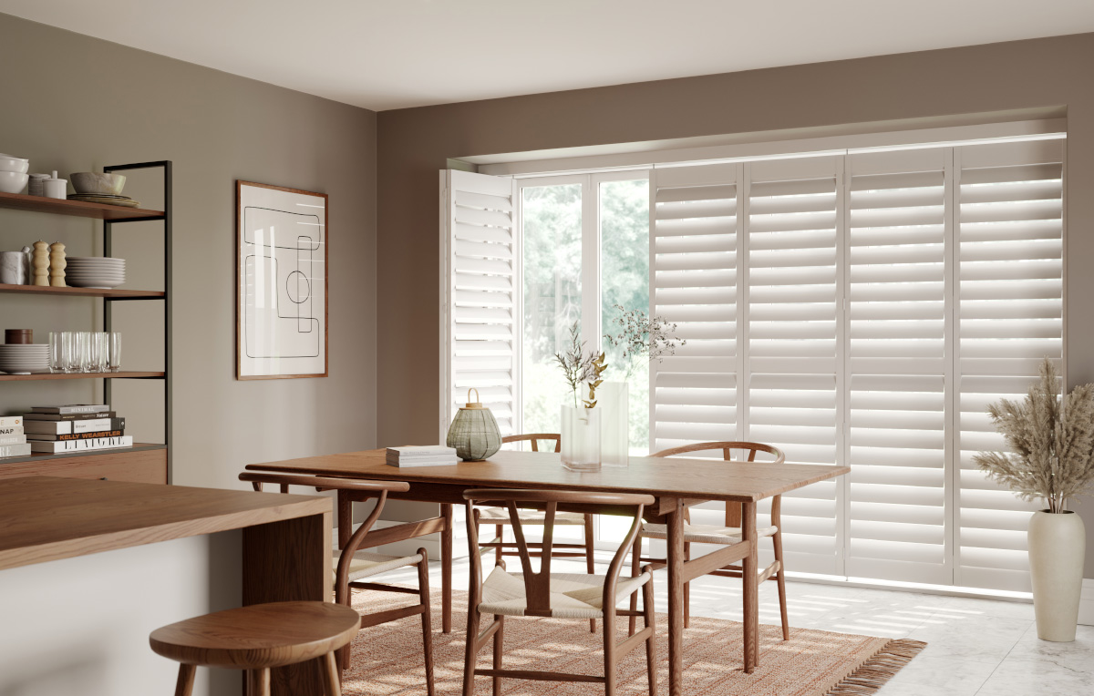 Dining_Room_Bifold_Track_Shutters_Traffic_White_114mm_Slats