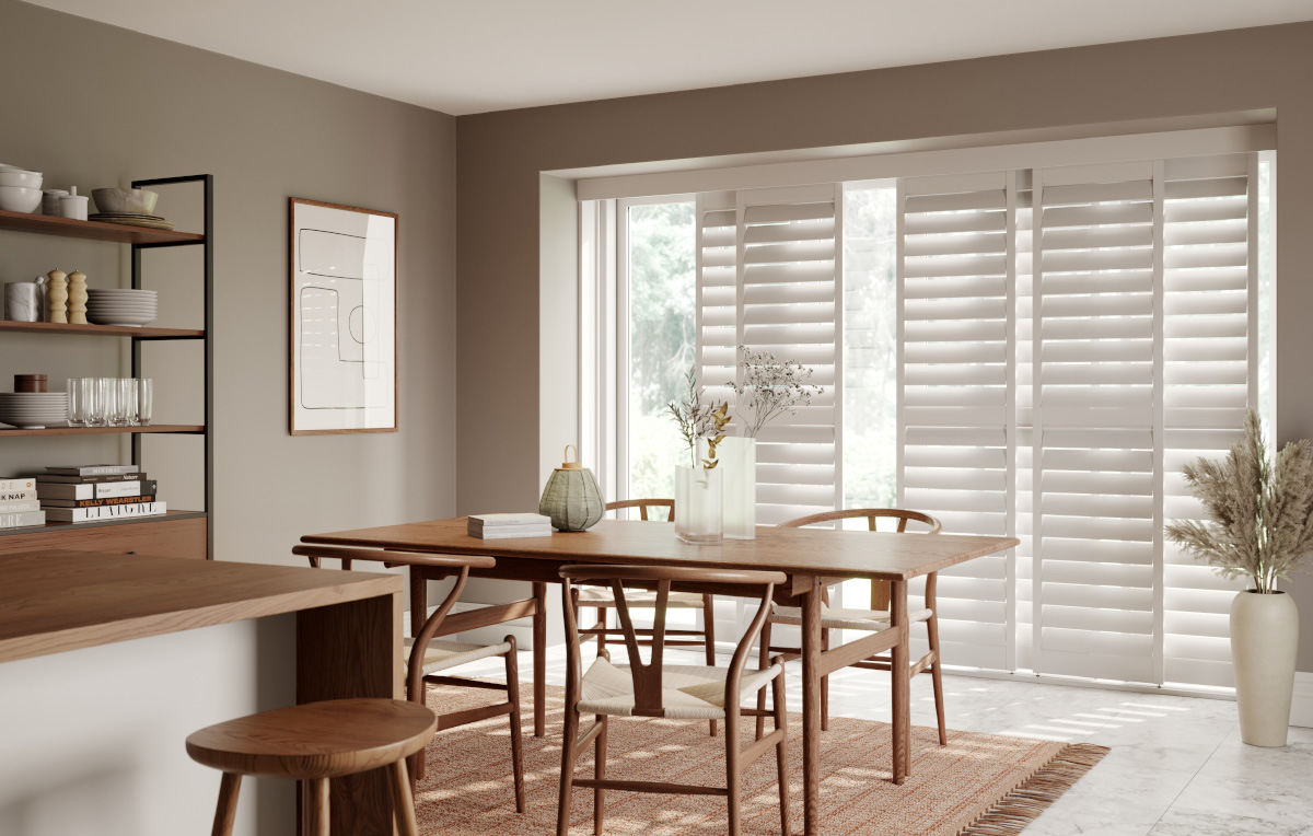 Dining_Room_By_Pass_Track_Shutters_Traffic_White_114mm_Slats